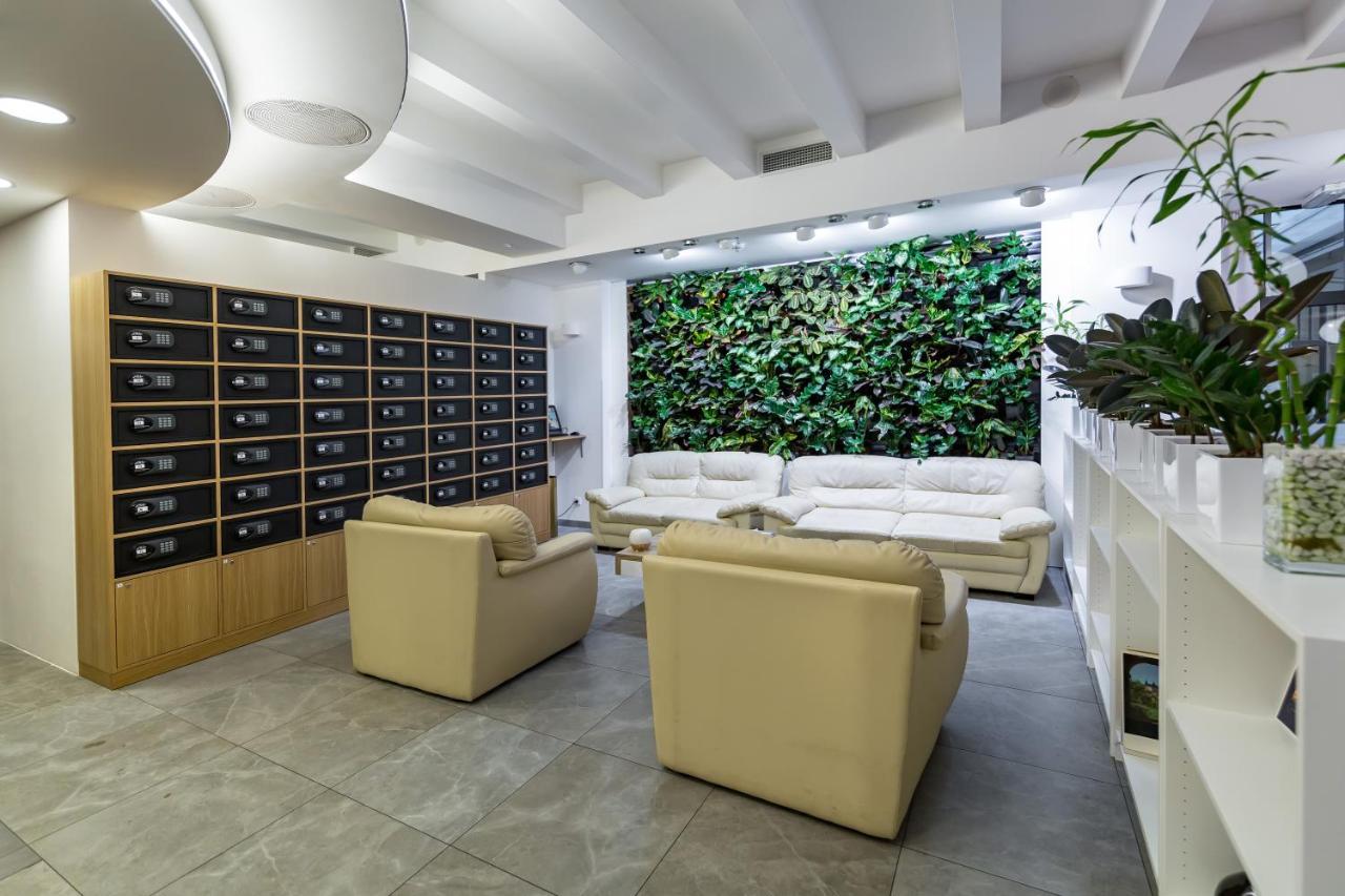 Merchants Crown Suites And Spa Прага Экстерьер фото Green wall in a modern office
